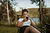 Young woman using cell phone