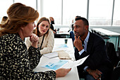 Business people having seminar in office