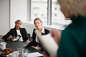 Women sitting at business meeting