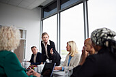 Woman talking during business meeting