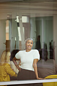 Portrait of businesswoman in office during meeting