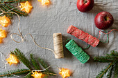 Apples and colorful strings for christmas decoration