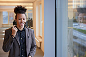 Smiling man standing in office