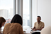 Teacher and adult students in class