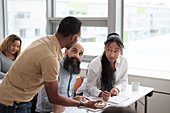 Teacher and adult students in class