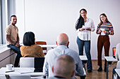 Women giving presentation at seminar