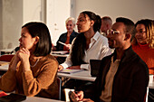 Group of adults sitting in class