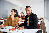 Portrait of smiling man in class