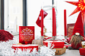 Red Christmas ornaments and candles