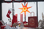 Red Christmas decorations on table