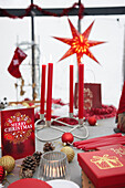 Red Christmas decorations on table