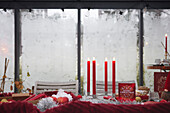 Red candles and Christmas decorations