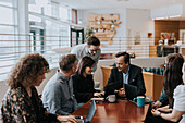 People talking during business meeting