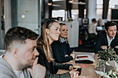 Smiling woman during business meeting