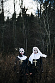 Two women dressed as nuns for Halloween