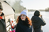 Smiling woman talking with friend