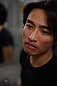 Close-up of pensive young man