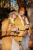 Senior couple having coffee outdoor