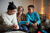 Children playing video games at home