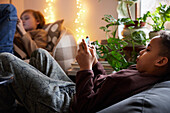 Children playing video games at home