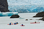 Kayaker's exploring Grey Lake and Grey Glacier, Torres del Paine National Park, Chile, Patagonia