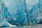 Kayaker's exploring Grey Lake in front of massive Grey Glacier, Torres del Paine National Park, Chile, Patagonia