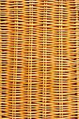 Close-up of closed wicker picnic basket 