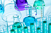 Close-up of laboratory glassware with liquids