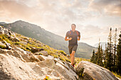 United States, Utah, Alpine, Man jogging in mountains