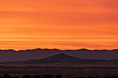 United States, New Mexico, Santa Fe, Colorful sky over desert 