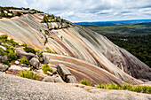 Australia, New South Wales, Bald Rock National Park, Scenic view of multicolored striped mountains