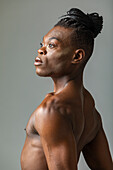 Studio shot of shirtless dancer