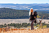 United States, Utah, Escalante, Portrait of senior hiker in rocky landscape
