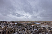 USA, Idaho, Bellevue, Winter sky over spring creek 