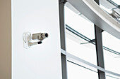 Security camera on wall of office building