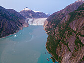 USA, Alaska, Tracy Arm-Fords Terror Wilderness, Aerial view of Dawes Glacier at end of Endicott Arm at dusk on summer evening