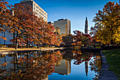 USA, Connecticut, Hartford, Bushnell Park, reflection of office buildings and Travelers Tower, Headquarters of the Travelers Insurance Company