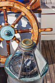 USA, Massachusetts, Cape Ann, Gloucester, America's Oldest Seaport, Gloucester Schooner Festival, schooner marine compass and ship's wheel