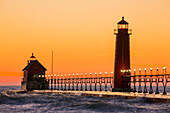 Grand Haven South Pier Lighthouse at sunset on Lake Michigan, Ottawa County, Grand Haven, Michigan