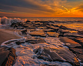 USA, New Jersey, Cape May National Seashore. Sunset on ocean shore