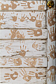 Taos Pueblo, New Mexico, Usa. Handprint door detail.