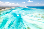 Aerial view of coral reef in the blue lagoon during low tide Paje, Jambiani, Zanzibar, Tanzania, East Africa, Africa