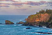 Sunset over the rugged coastline of Norfolk Island, Australia, Pacific
