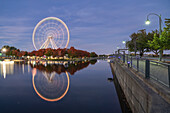 Ferris Wheel at La Grande Roue de Montreal at sunset, Old Port of Montreal, Quebec, Canada, North America