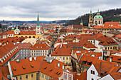 Red roofs of Lesser Quarter dominated by St Nicholas church and St Thomas church, UNESCO World Heritage Site, Prague, Czech Republic (Czechia), Europe