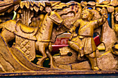Detail of metallic decoration portraying horse and knight inside temple, Yangon, Myanmar (Burma), Asia