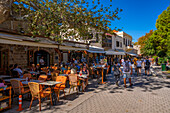 View of bars and restaurants, Rhodes Old Town, Rhodes, Dodecanese Island Group, Greek Islands, Greece, Europe