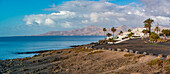 View of coastline and Playa El Barranquillo beach, Puerto Carmen, Lanzarote, Las Palmas, Canary Islands, Spain, Atlantic, Europe