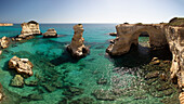 Rock stacks and crystal clear sea of the Faraglioni di Sant Andrea, Torre di Sant Andrea, Melendugno, Lecce Province, Puglia, Italy, Europe