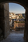 View through arch over the Sassi di Matera old town, UNESCO World Heritage Site, Matera, Basilicata, Italy, Europe